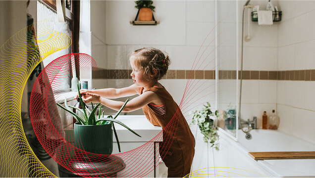 A child washing their hands.