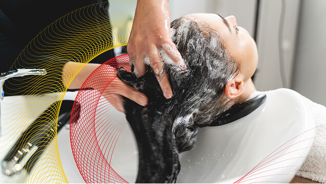 A woman having her hair washed.